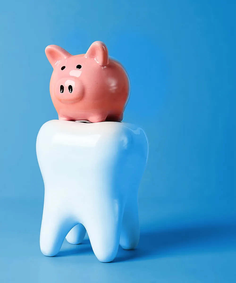 3D rendering of a tooth with a piggy bank on top against a blue background.